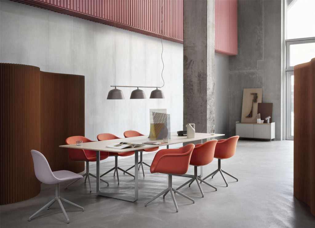 muuto designed ambit rail pendant hanging above a dining table