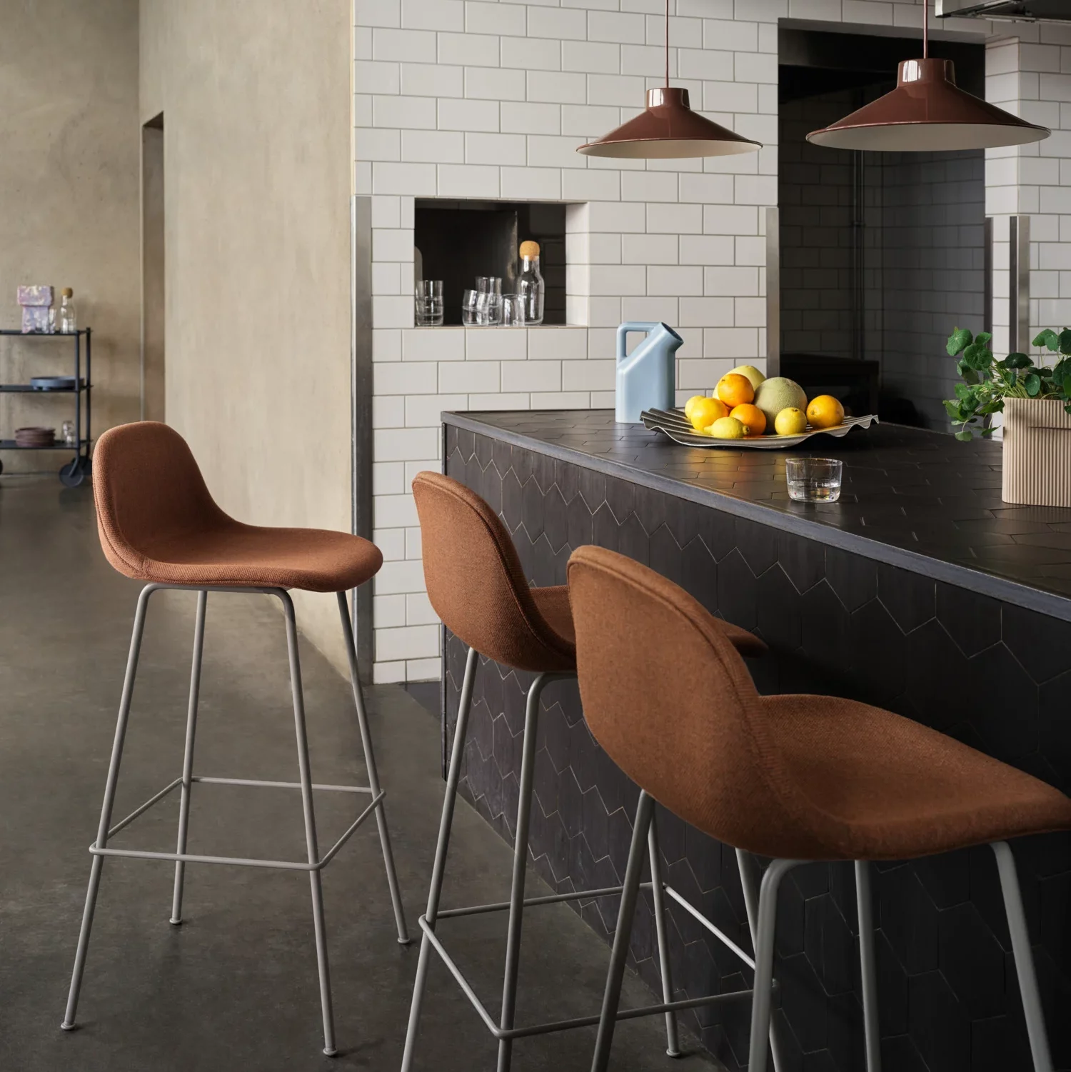 Brown fabric kitchen counter stools.