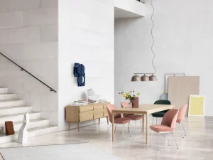 A dining area with a wooden buffet table.