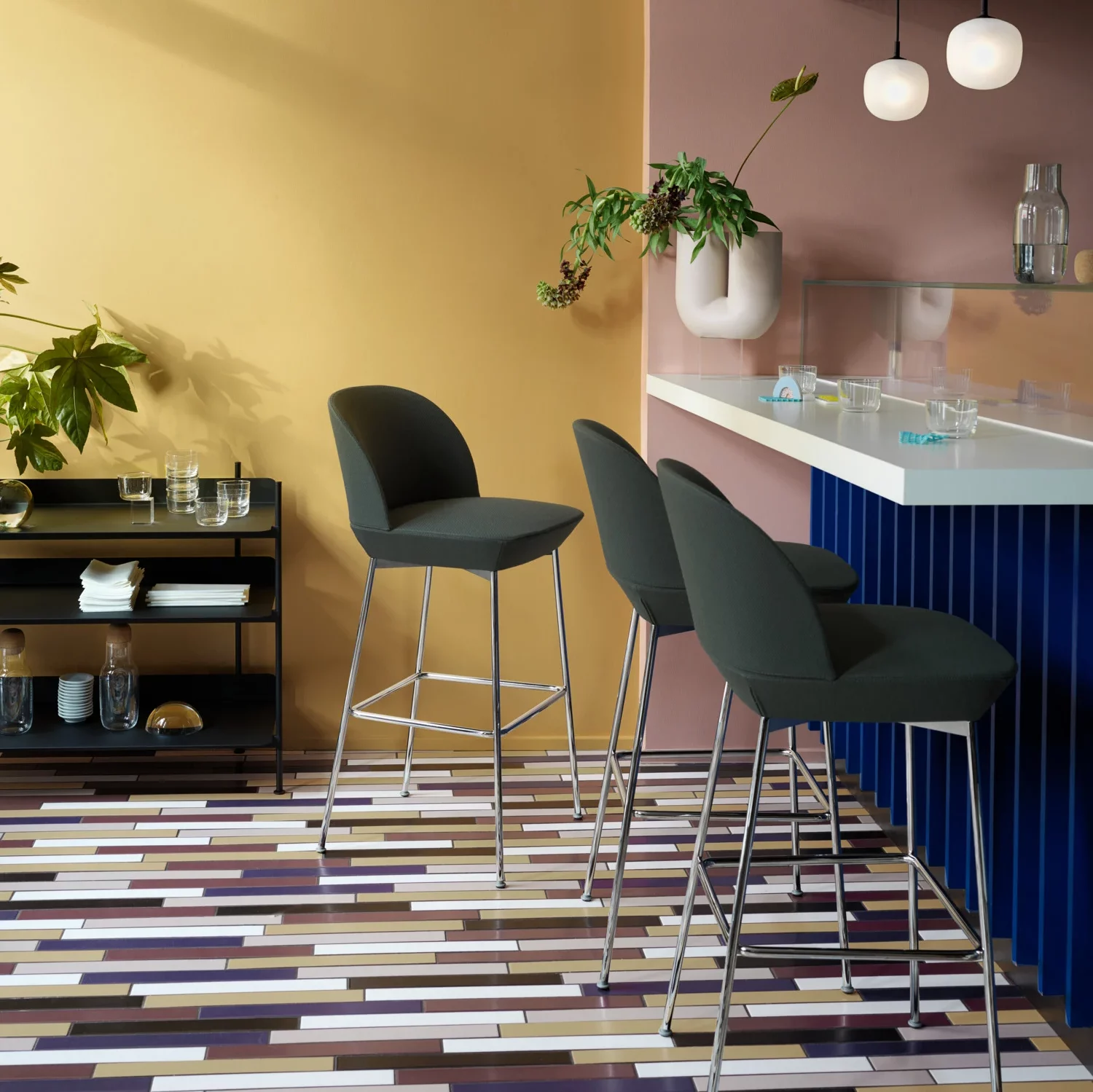 Green fabric kitchen stools.