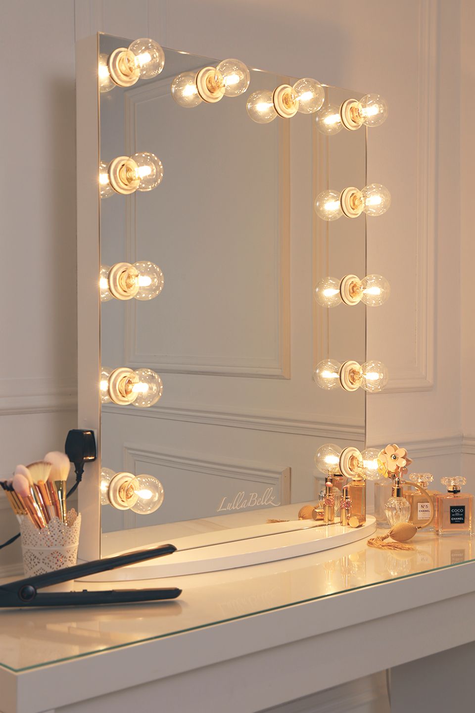 Make up mirror with yellow lights turned on.