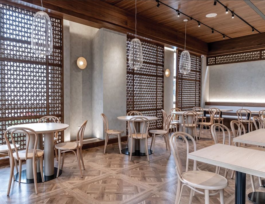 An elegant dining area featuring bentwood chairs.