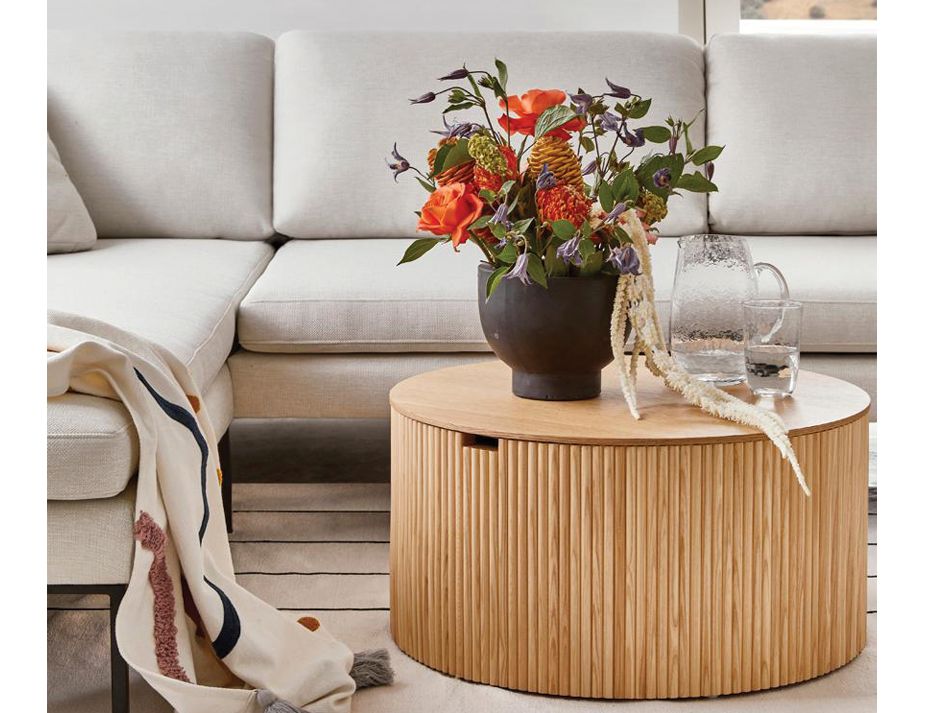 A wooden coffee table with storage.