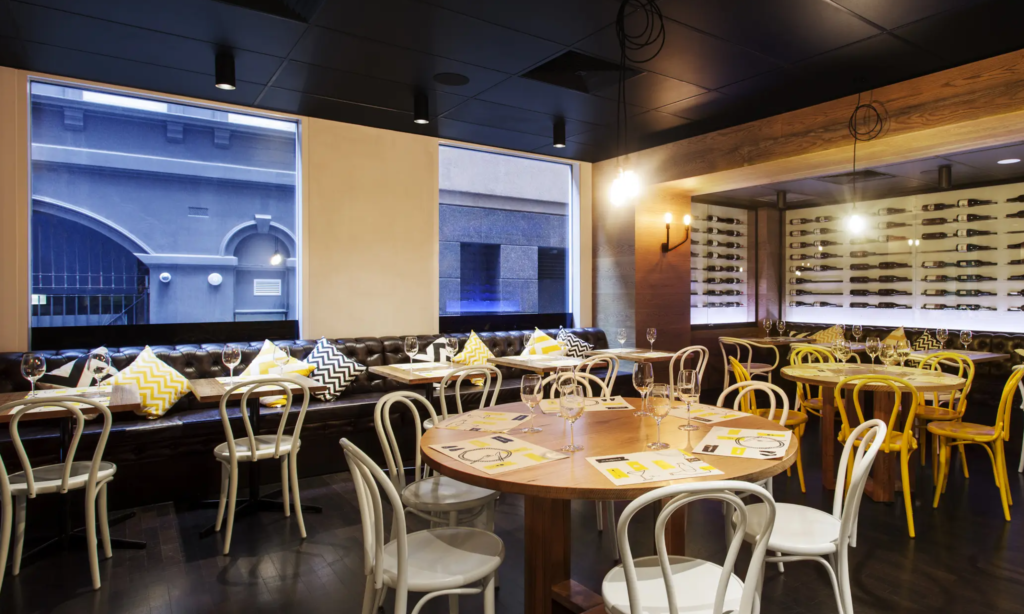 A restaurant interior with bentwood chairs.