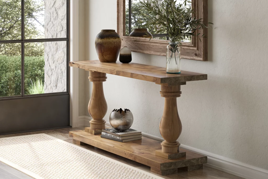A rustic wooden console table with intricately carved pedestal legs. 