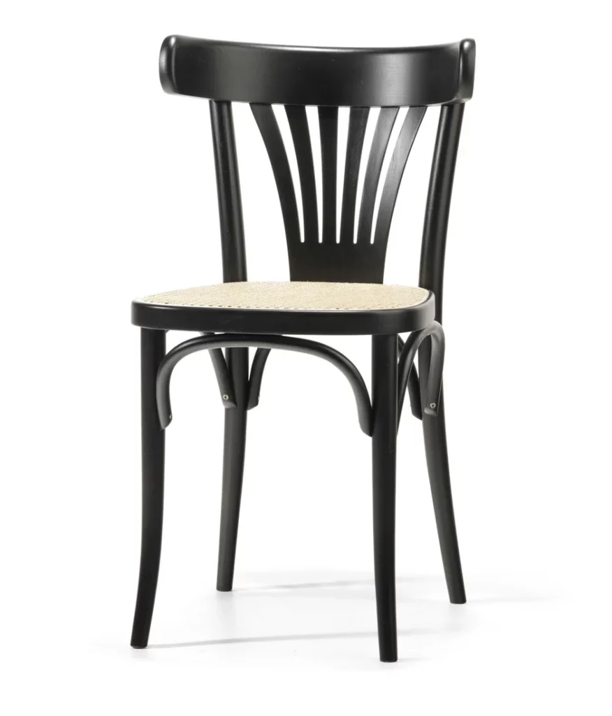 A black 56 bentwood chair with woven seat.
