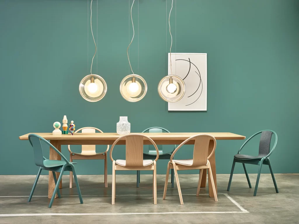 A contemporary dining space featuring bentwood chairs.