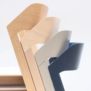 A close-up shot capturing the backs of three chairs.