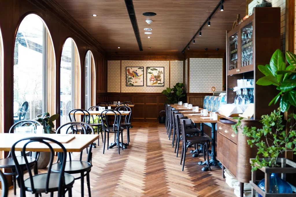 Empty cafe interior with bentwood chairs.