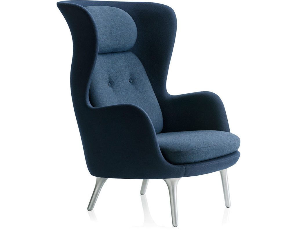 A dark blue modern high-back chair.
