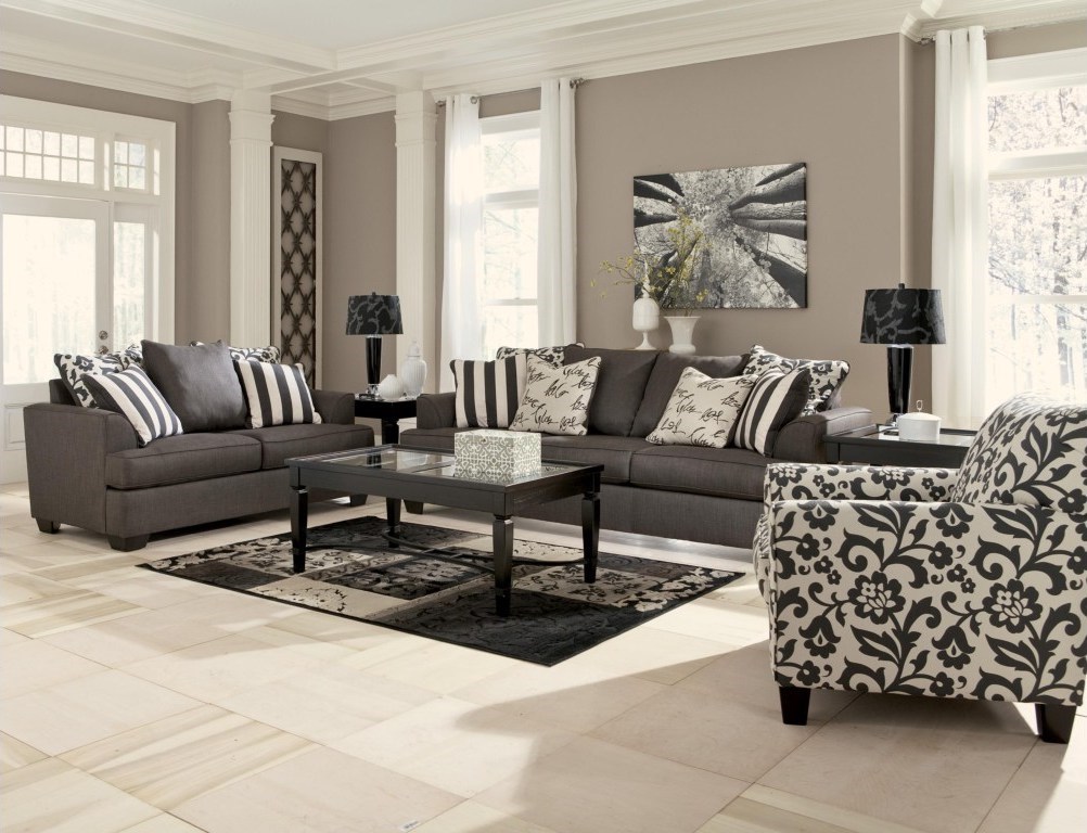 Traditional living room with patterned accents and natural light.